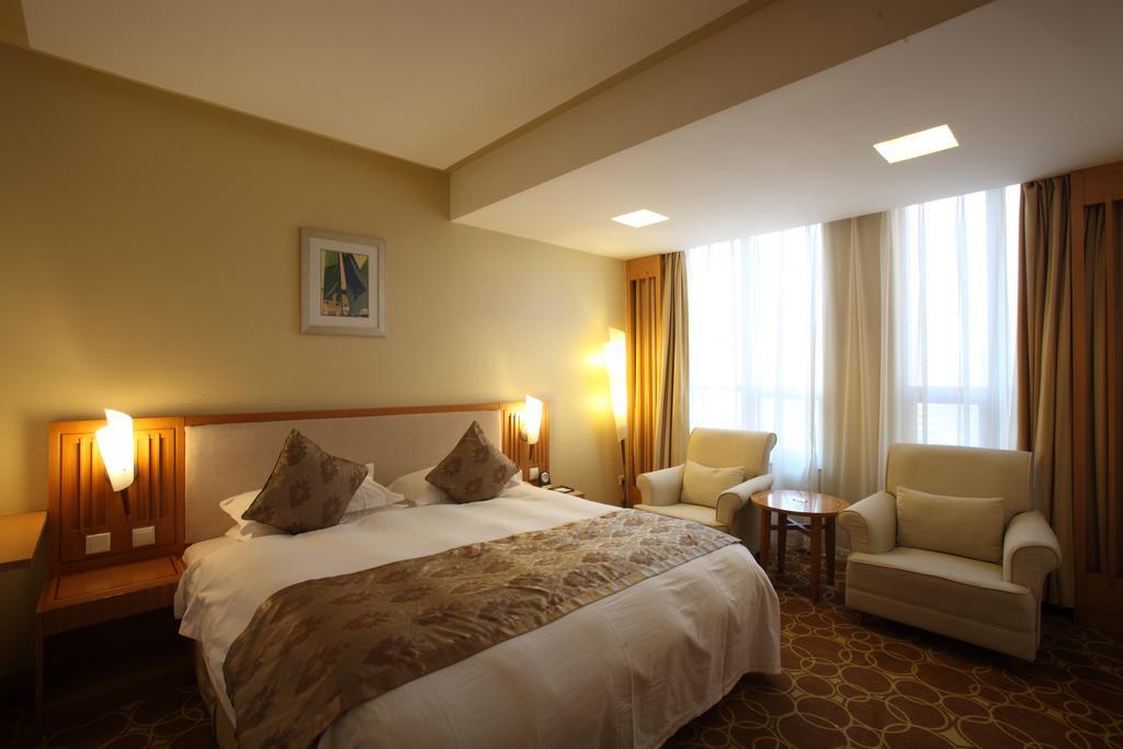 Beijing Wuhuan Hotel Zimmer foto