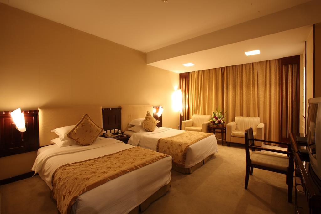 Beijing Wuhuan Hotel Zimmer foto